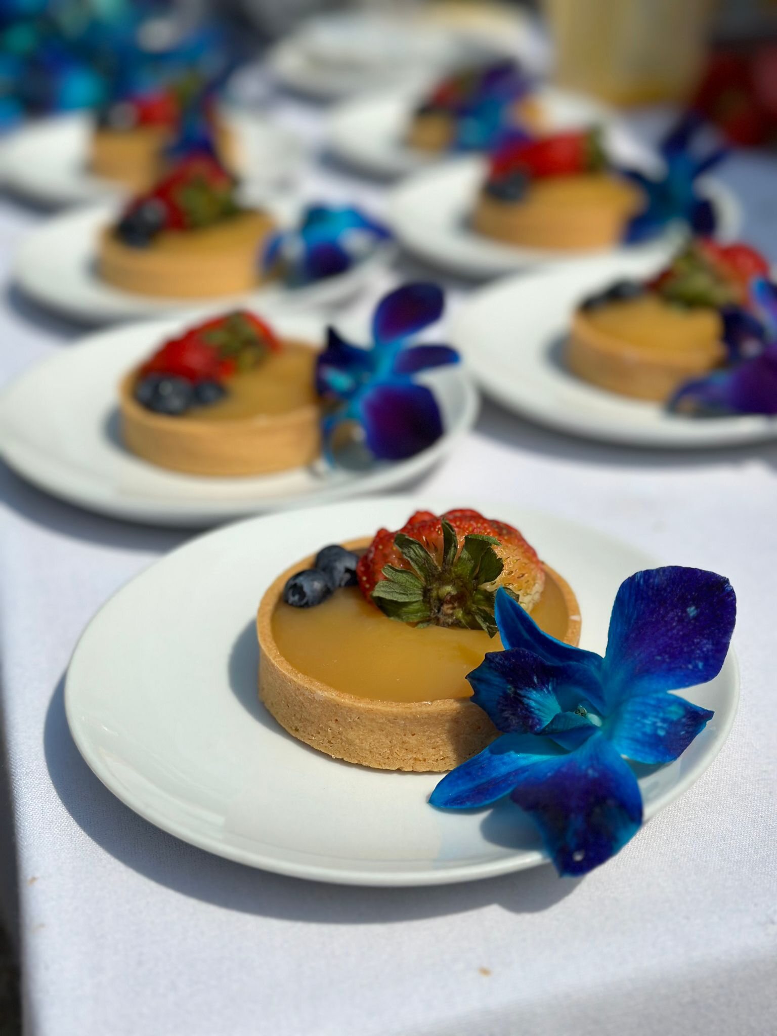 Lemon tart with seasonal berries